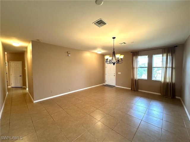 8091 Allamanda Ct, Lehigh Acres, FL 33972 - spare room with light tile patterned floors, baseboards, visible vents, and a notable chandelier