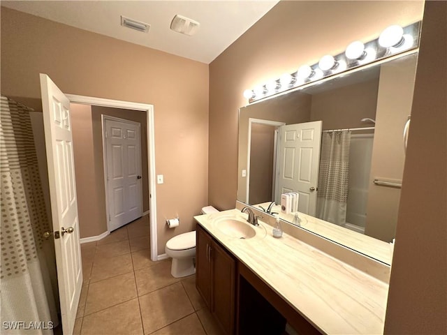 8091 Allamanda Ct, Lehigh Acres, FL 33972 - bathroom featuring visible vents, toilet, tile patterned flooring, and vanity