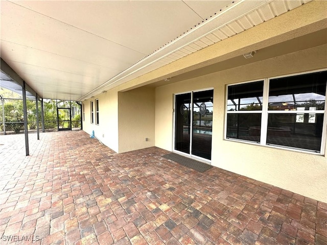 8091 Allamanda Ct, Lehigh Acres, FL 33972 - view of patio featuring a lanai