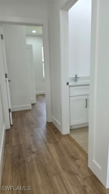 5005 Eifel Ln, Labelle, FL 33935 - hall featuring light wood-style floors