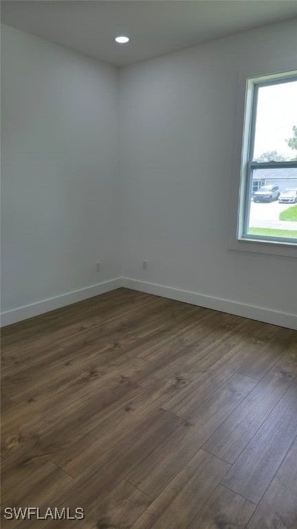 5005 Eifel Ln, Labelle, FL 33935 - spare room with dark wood finished floors and recessed lighting
