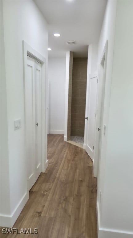 5005 Eifel Ln, Labelle, FL 33935 - corridor with wood finished floors and recessed lighting