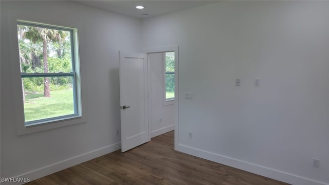 5005 Eifel Ln, Labelle, FL 33935 - empty room featuring dark wood finished floors and recessed lighting