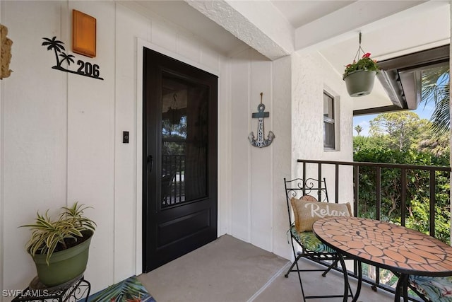4967 Pepper Cir Unit 206, Naples, FL 34113 - property entrance featuring outdoor dining area