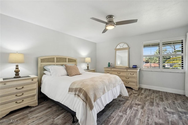 4967 Pepper Cir Unit 206, Naples, FL 34113 - bedroom with wood finished floors, baseboards, and ceiling fan