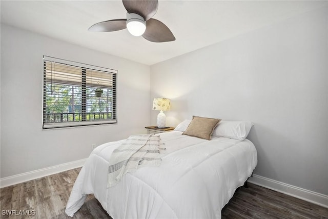 4967 Pepper Cir Unit 206, Naples, FL 34113 - bedroom featuring baseboards, wood finished floors, and ceiling fan