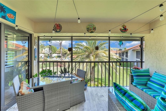 4967 Pepper Cir Unit 206, Naples, FL 34113 - sunroom / solarium with wood finished floors