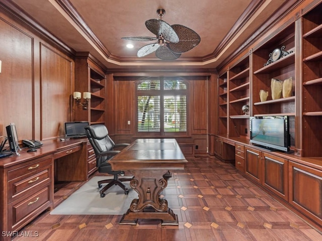 4244 Brynwood Dr, Naples, FL 34119 - office area featuring wood walls, built in features, crown molding, and ceiling fan