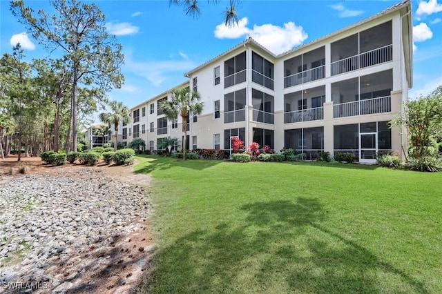 exterior space featuring a lawn