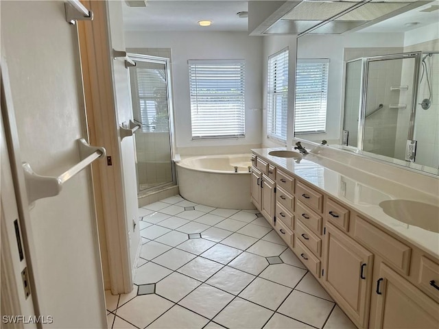 4830 Shearwater Ln, Naples, FL 34119 - bathroom with a shower stall, a sink, double vanity, and a garden tub
