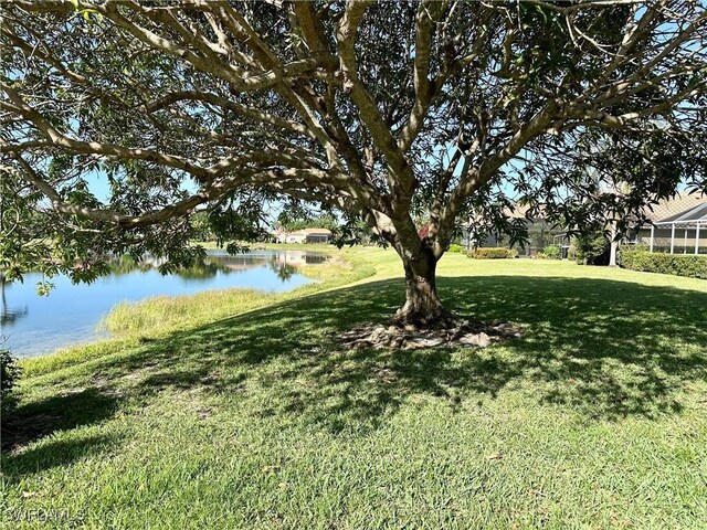 4830 Shearwater Ln, Naples, FL 34119 - view of yard featuring a water view