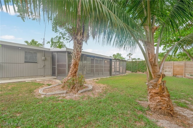 view of yard featuring fence