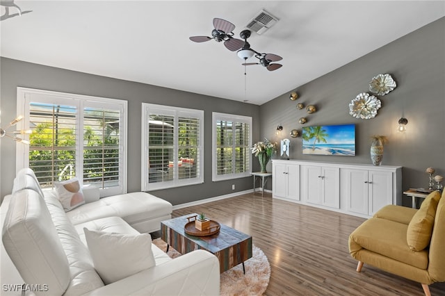 3701 Bali Ln, Estero, FL 33928 - living area with baseboards, visible vents, wood finished floors, and ceiling fan