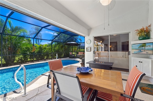 3701 Bali Ln, Estero, FL 33928 - outdoor pool with glass enclosure, outdoor dining area, and a patio area