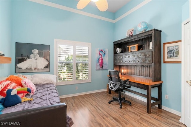 3701 Bali Ln, Estero, FL 33928 - office with baseboards, crown molding, wood finished floors, and a ceiling fan