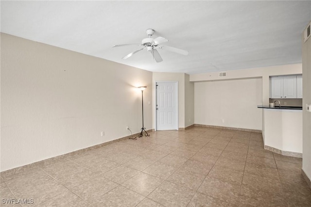8245 Ibis Club Dr Unit 401, Naples, FL 34104 - spare room with baseboards, visible vents, and a ceiling fan
