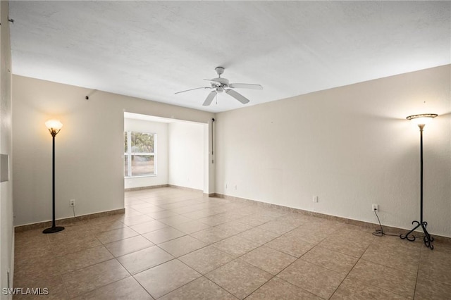 8245 Ibis Club Dr Unit 401, Naples, FL 34104 - unfurnished room with baseboards, ceiling fan, and tile patterned floors