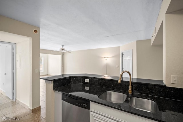 8245 Ibis Club Dr Unit 401, Naples, FL 34104 - kitchen with a sink, dark stone counters, light tile patterned floors, and dishwasher