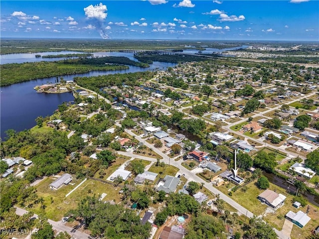 231 Kingston Dr, Fort Myers, FL 33905 - aerial overview of property's location with a nearby body of water and nearby suburban area