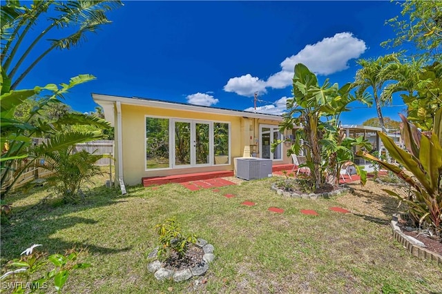 231 Kingston Dr, Fort Myers, FL 33905 - rear view of property with stucco siding