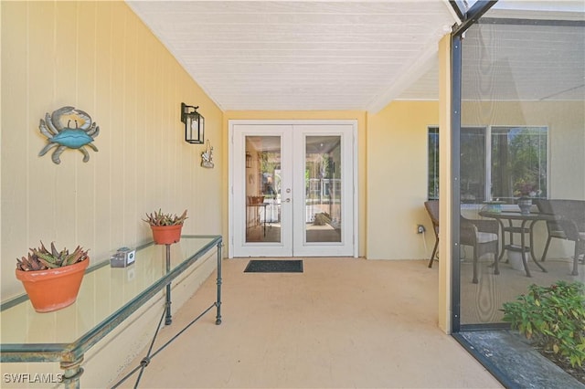 231 Kingston Dr, Fort Myers, FL 33905 - view of exterior entry with french doors and a patio