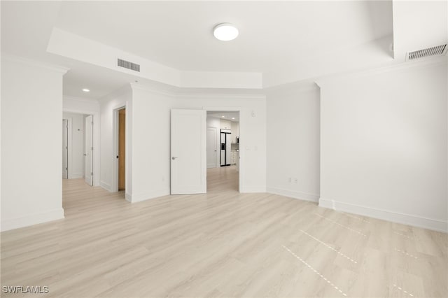 9123 Strada Pl Unit 7316, Naples, FL 34108 - empty room with baseboards, crown molding, and light wood-style floors