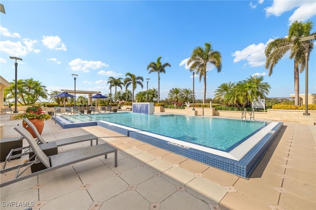 9123 Strada Pl Unit 7316, Naples, FL 34108 - community pool with a patio area