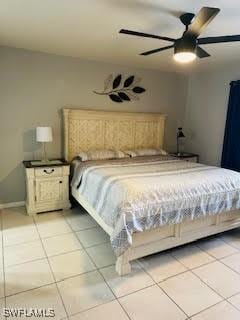 bedroom with light tile patterned flooring and a ceiling fan