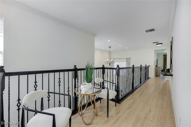 10327 Carolina Willow Dr, Fort Myers, FL 33913 - hall with a chandelier, wood finished floors, and recessed lighting