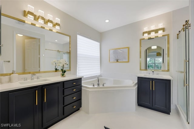 10327 Carolina Willow Dr, Fort Myers, FL 33913 - bathroom featuring two vanities, healthy amount of natural light, a stall shower, and a garden tub
