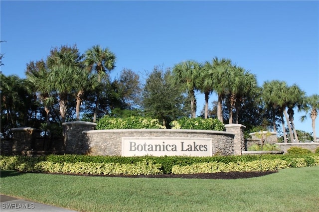 10327 Carolina Willow Dr, Fort Myers, FL 33913 - community / neighborhood sign with a lawn