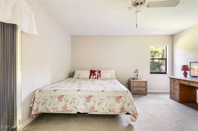 9648 Windsor Gardens Ln Unit 104, Fort Myers, FL 33919 - carpeted bedroom with baseboards and a ceiling fan