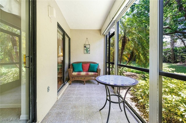 9648 Windsor Gardens Ln Unit 104, Fort Myers, FL 33919 - sunroom / solarium featuring healthy amount of natural light