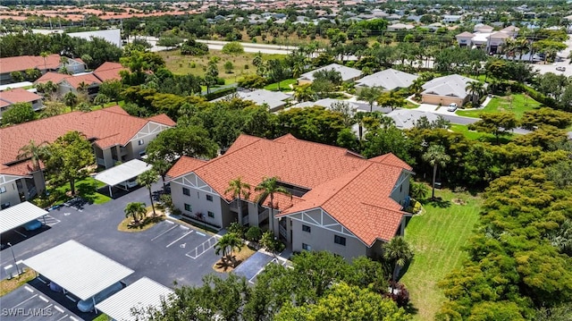 9648 Windsor Gardens Ln Unit 104, Fort Myers, FL 33919 - aerial perspective of suburban area