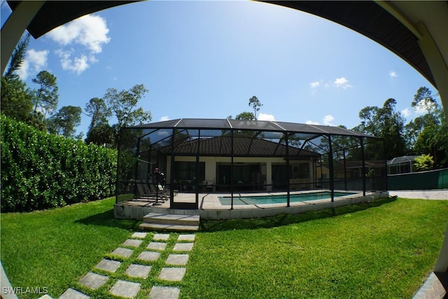 3393 21st Ave SW, Naples, FL 34117 - outdoor pool with a yard, glass enclosure, and a patio area