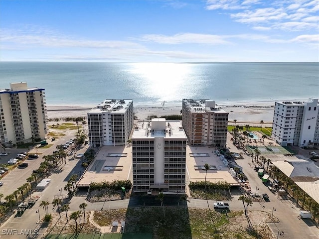 7148 Estero Blvd Unit 423, Fort Myers Beach, FL 33931 - drone / aerial view featuring a water view, a beach view, and a city view