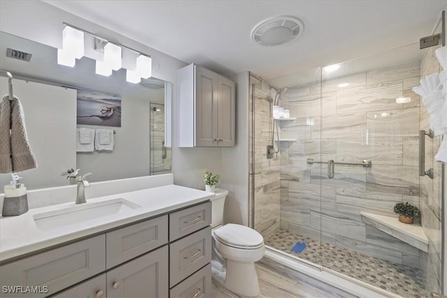 7148 Estero Blvd Unit 423, Fort Myers Beach, FL 33931 - bathroom featuring a stall shower, visible vents, toilet, and vanity