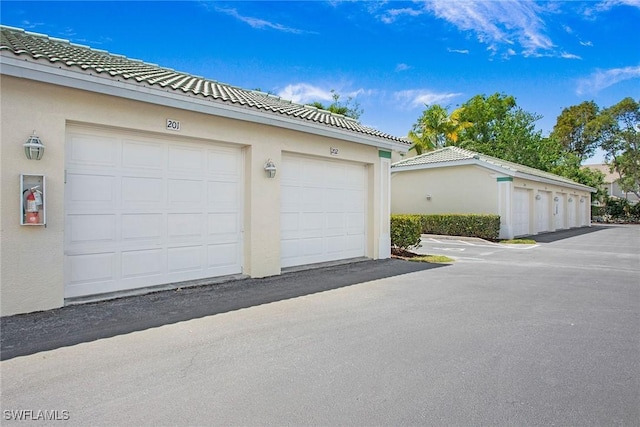 4940 Cougar Ct S Unit 201, Naples, FL 34109 - view of garage