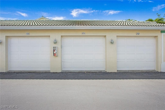 4940 Cougar Ct S Unit 201, Naples, FL 34109 - view of garage