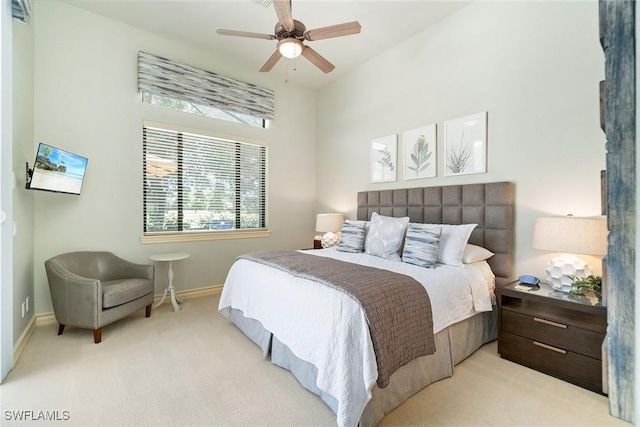 12581 Vittoria Way, Fort Myers, FL 33912 - carpeted bedroom featuring baseboards and ceiling fan