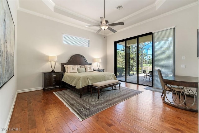 12581 Vittoria Way, Fort Myers, FL 33912 - bedroom with access to exterior, a raised ceiling, dark wood finished floors, crown molding, and baseboards