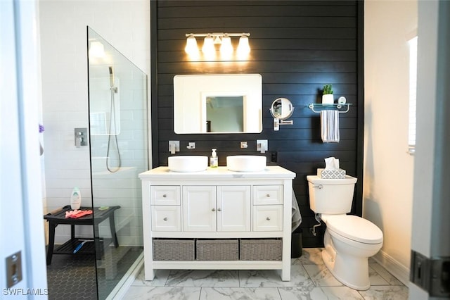 2533 SW 17th Pl, Cape Coral, FL 33914 - bathroom featuring marble finish floor, vanity, toilet, and walk in shower
