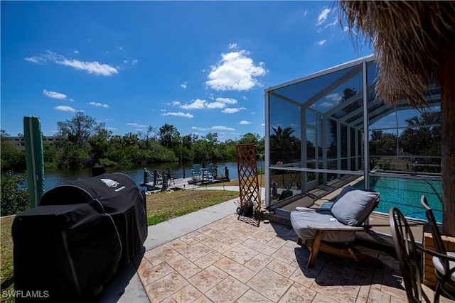 4238 Gardner Dr, Port Charlotte, FL 33952 - view of patio / terrace with area for grilling, a water view, a lanai, and an outdoor pool