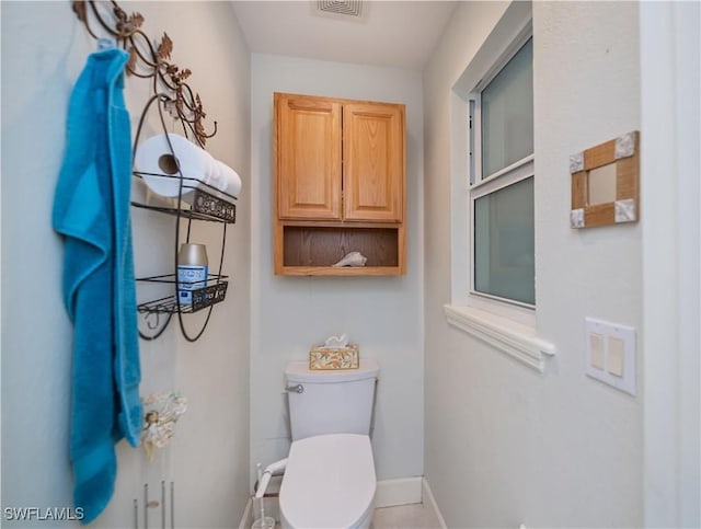4238 Gardner Dr, Port Charlotte, FL 33952 - half bathroom featuring toilet, baseboards, and visible vents