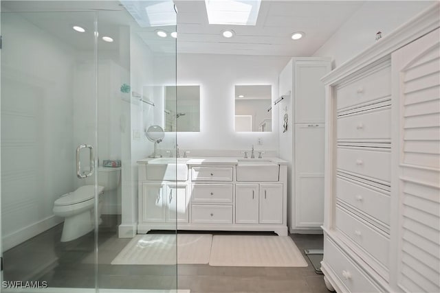 4238 Gardner Dr, Port Charlotte, FL 33952 - bathroom with a sink, double vanity, toilet, recessed lighting, and a stall shower