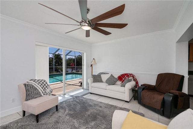 4238 Gardner Dr, Port Charlotte, FL 33952 - living area featuring tile patterned floors, ornamental molding, baseboards, and a ceiling fan