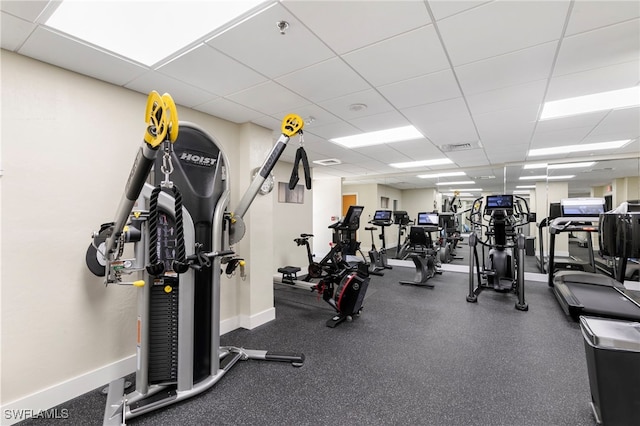 520 S Collier Blvd Unit 706, Marco Island, FL 34145 - exercise room featuring a drop ceiling and baseboards