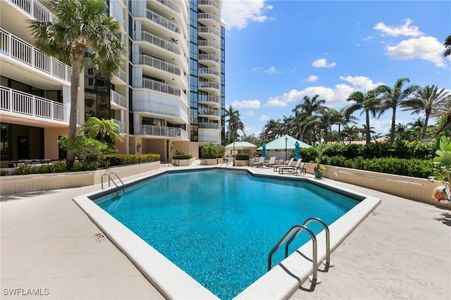 520 S Collier Blvd Unit 706, Marco Island, FL 34145 - community pool with a patio area