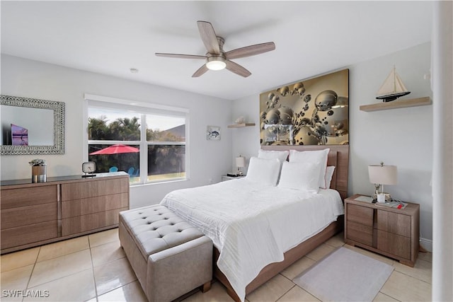 bedroom featuring ceiling fan and light tile patterned floors