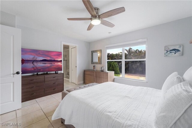 bedroom with baseboards, a ceiling fan, and light tile patterned floors
